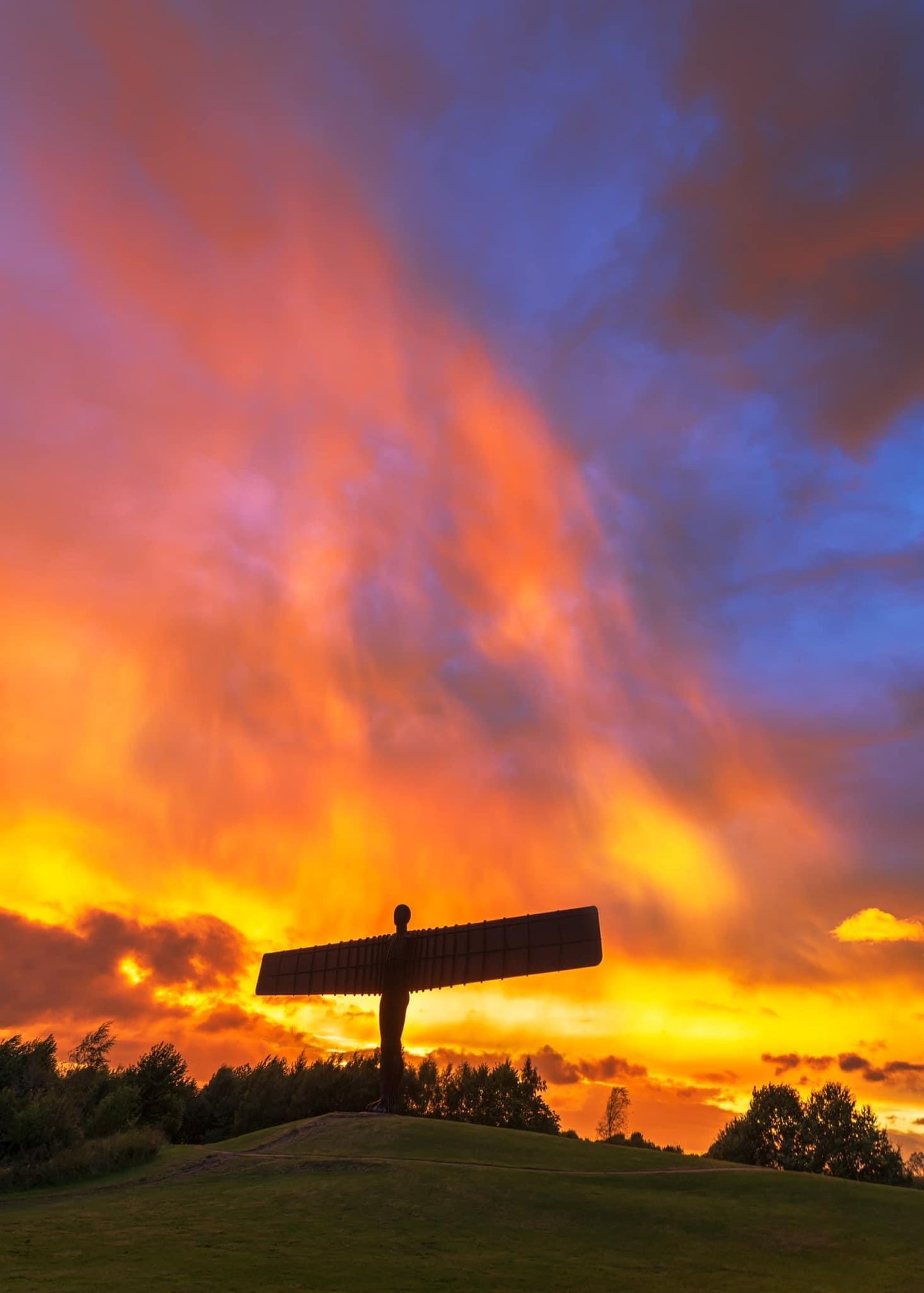 Fire sky at the Angel of the North.