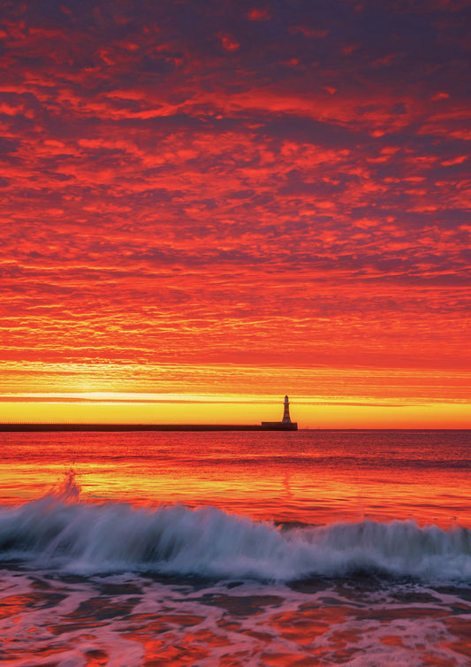 Beautiful fiery sunrise at Roker Beach.