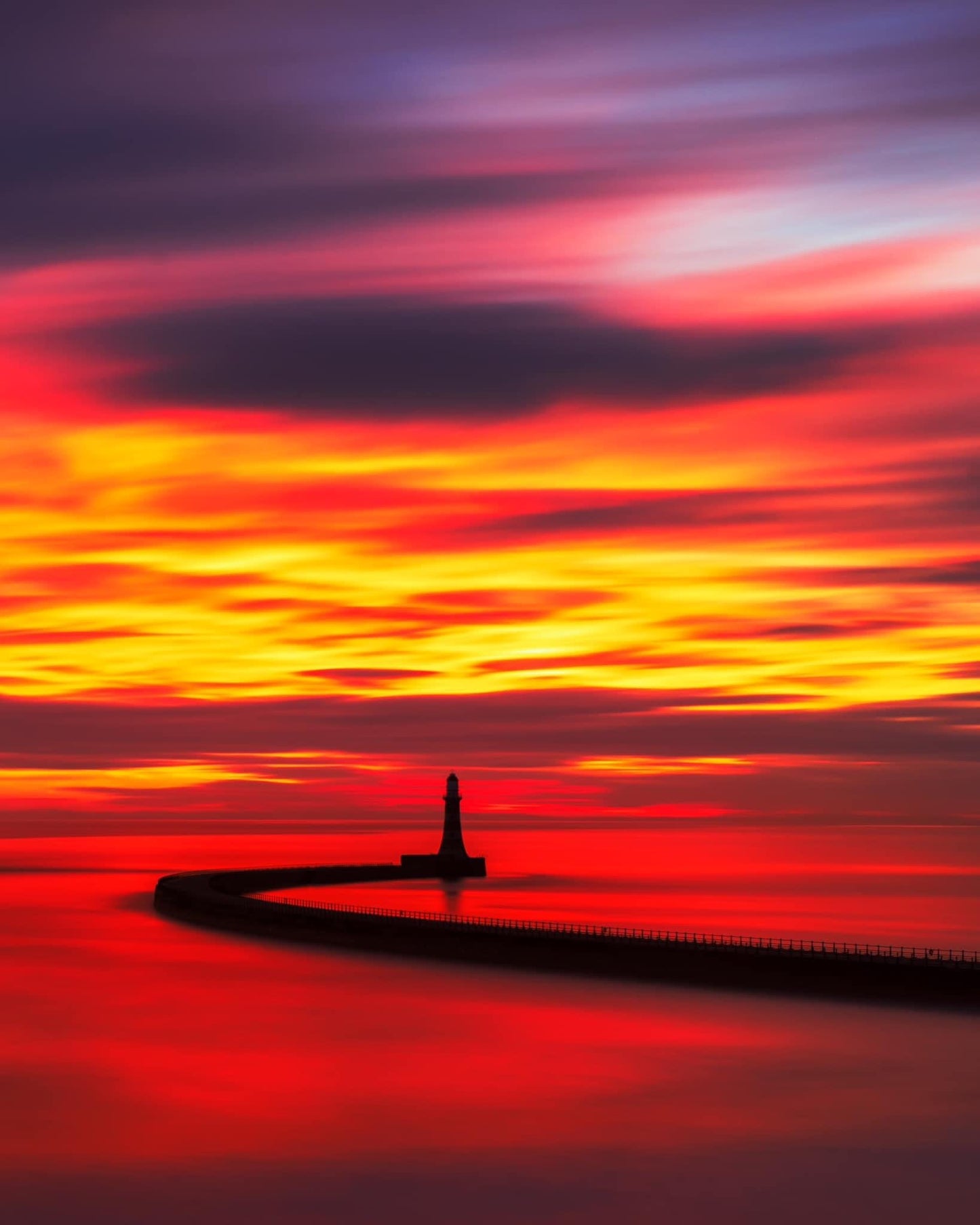 Long exposure fire sky at Roker.