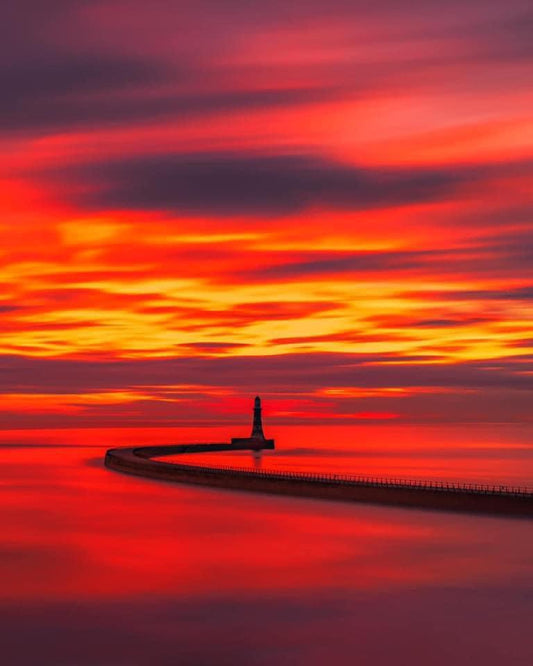 Long exposure of beautiful red skies at Roker.