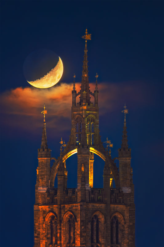 Newcastle Cathedral with a crescent moon.
