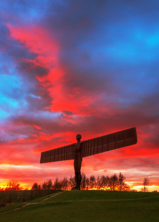 Glorious red  sunset clouds at the Angel of the North.
