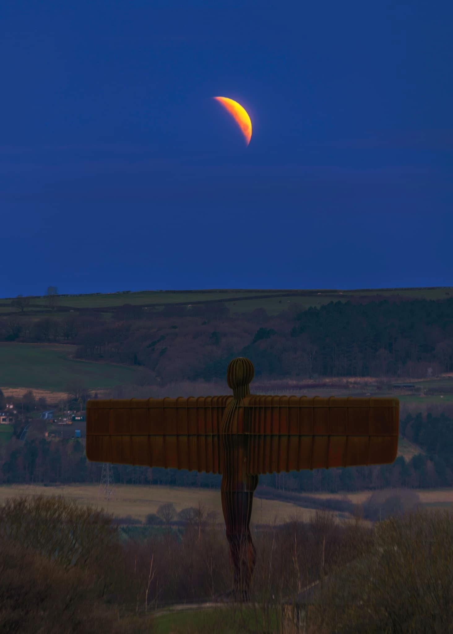 A Partial Lunar Eclipse Over The Angel Of The North Stevie a-partial-lunar-eclipse-over-the-angel-of-the-north-stevie