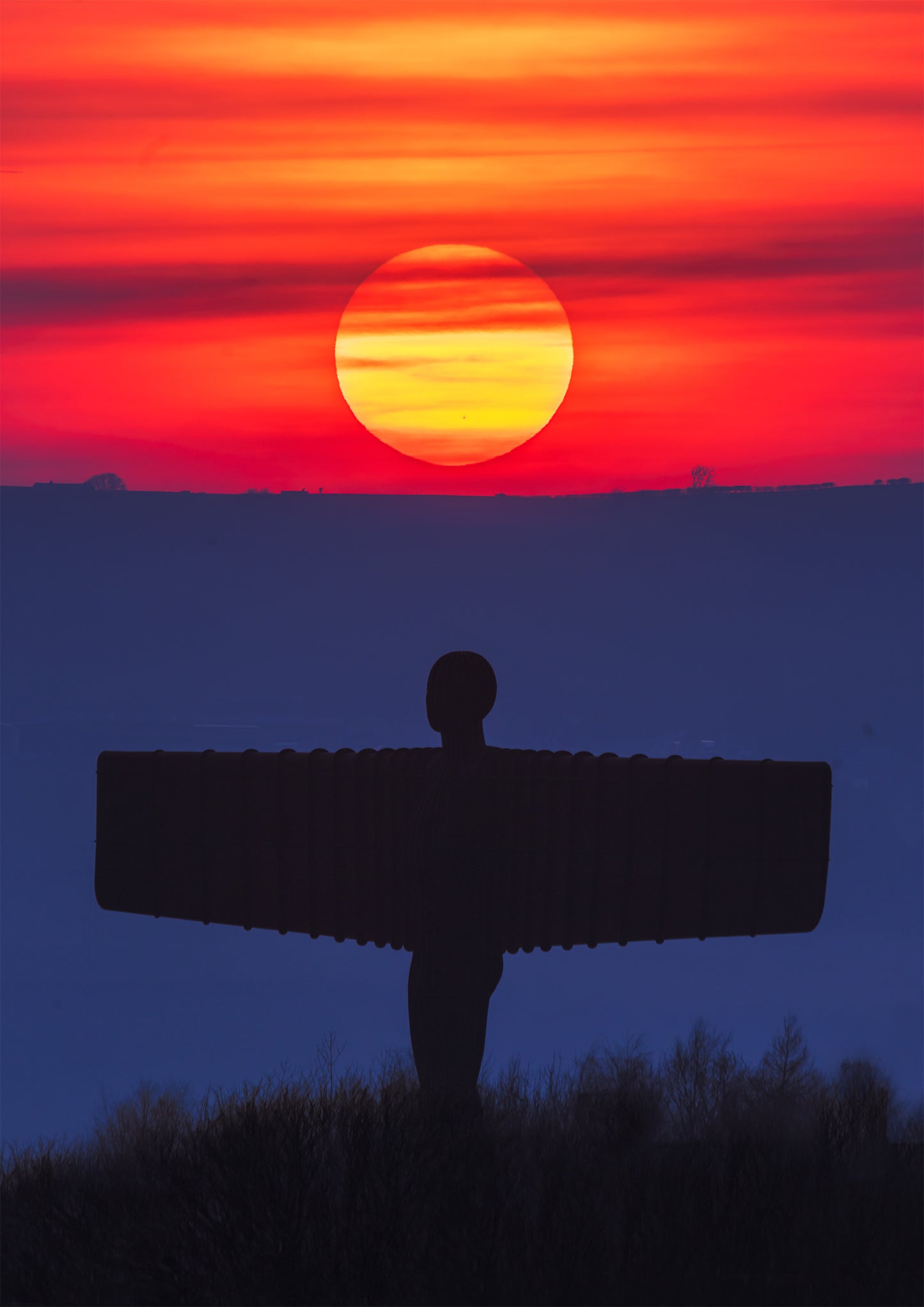 Hazy sunset over the Angel of the North.