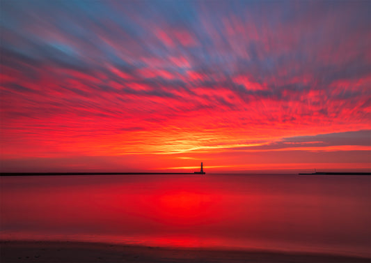Long exposure of a gloriously colourful Roker sunrise.
