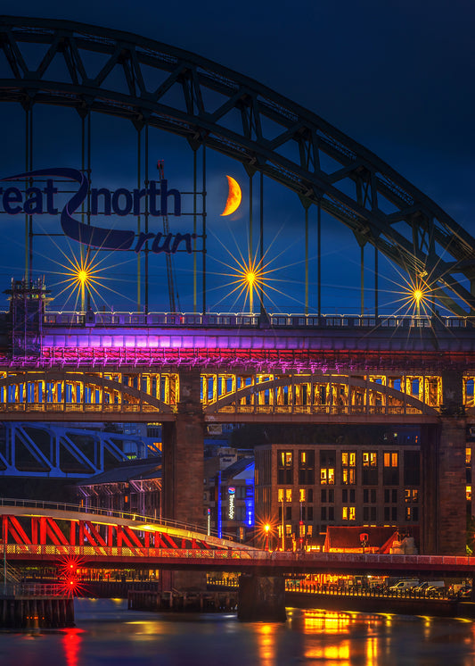 Beautiful Crescent moon inside the bars of the Tyne bridge.