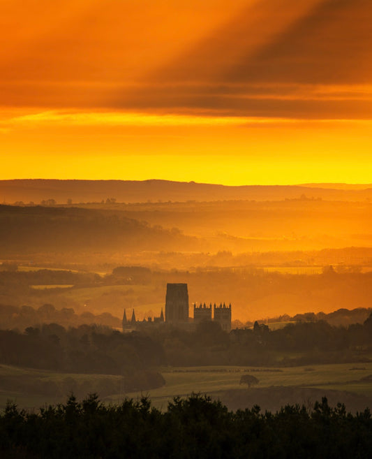 A beautiful golden sunrise over Durham Cathedral.