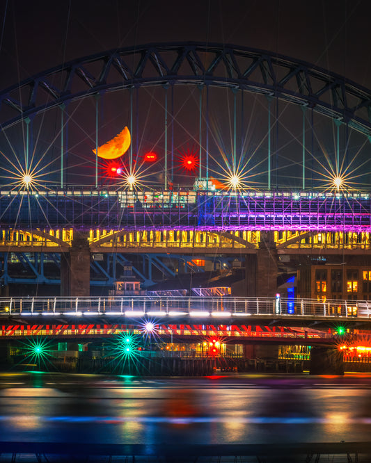 Stunning Crescent moon behind Tyne Bridge in Newcastle,