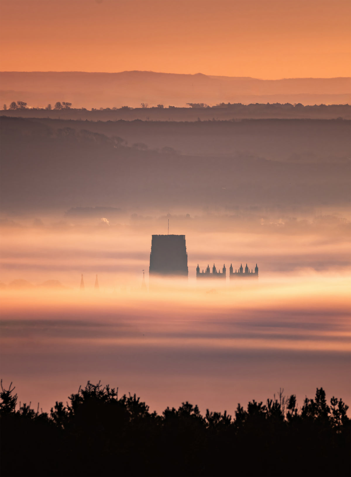 An almost buried Durham Cathedral in the mist.