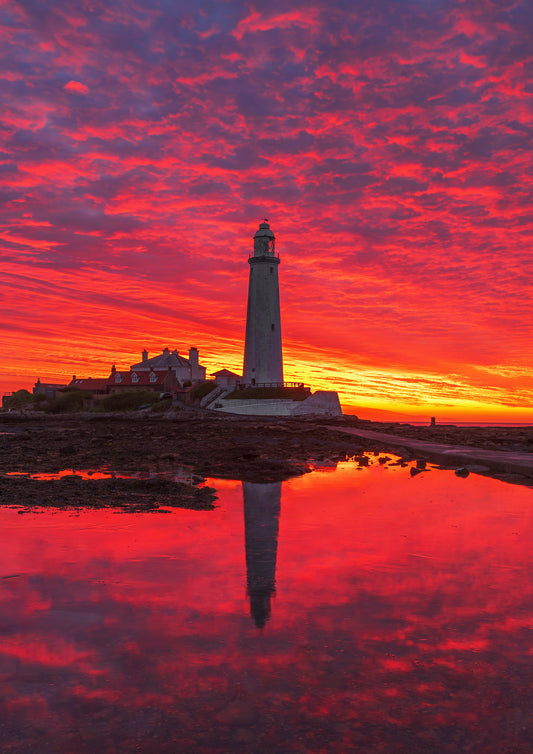 Beautiful pre sunrise sky and reflections at St. Mary's Lighthouse, Whitley Bay