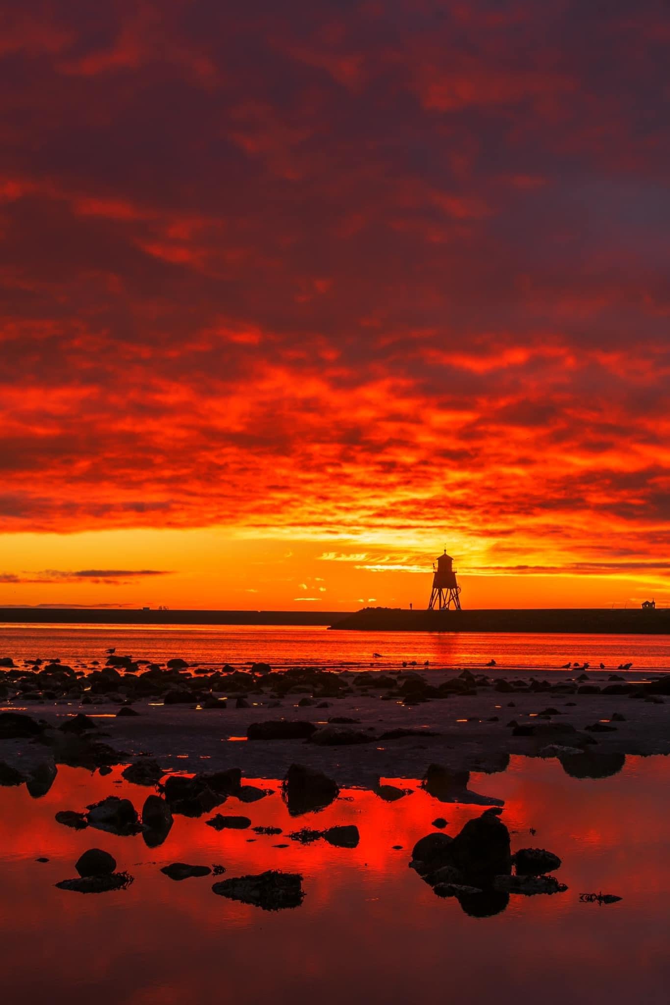 Amazing sunrise sky at Herd Groyne