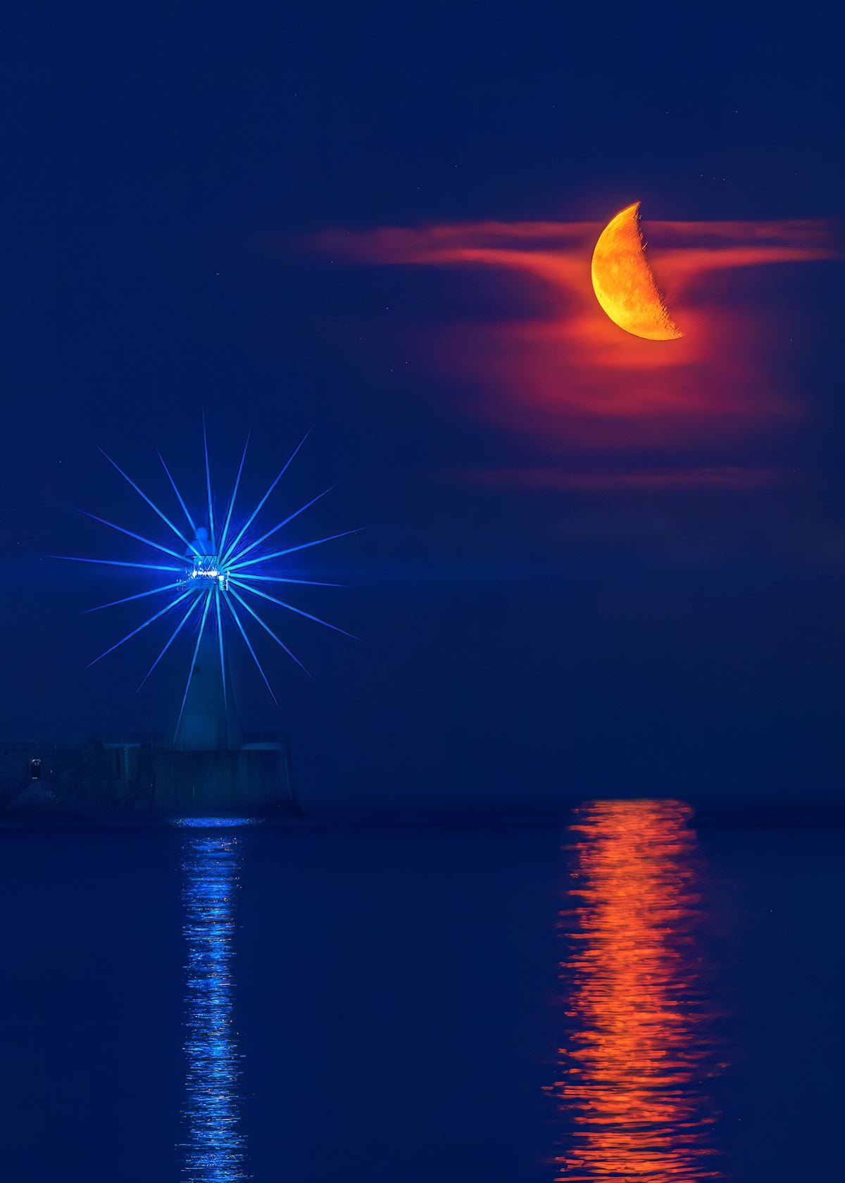 Beautiful Crescent moon over Tynemouth Lighthouse.