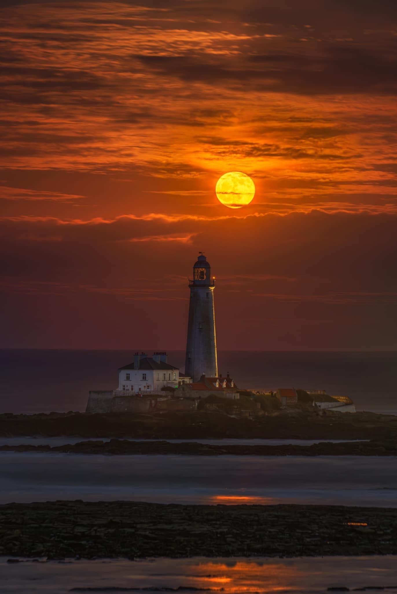 Beautiful full moon over St. Mary’s Lighthouse.