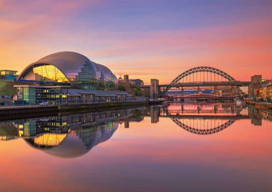 Pink tones and perfect reflections on Newcastle Quayside.