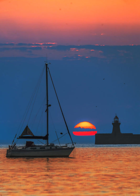 Sunrise and a lovely boat.