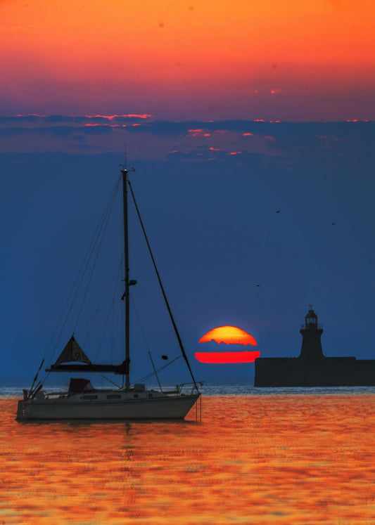 Sunrise and a lovely boat.