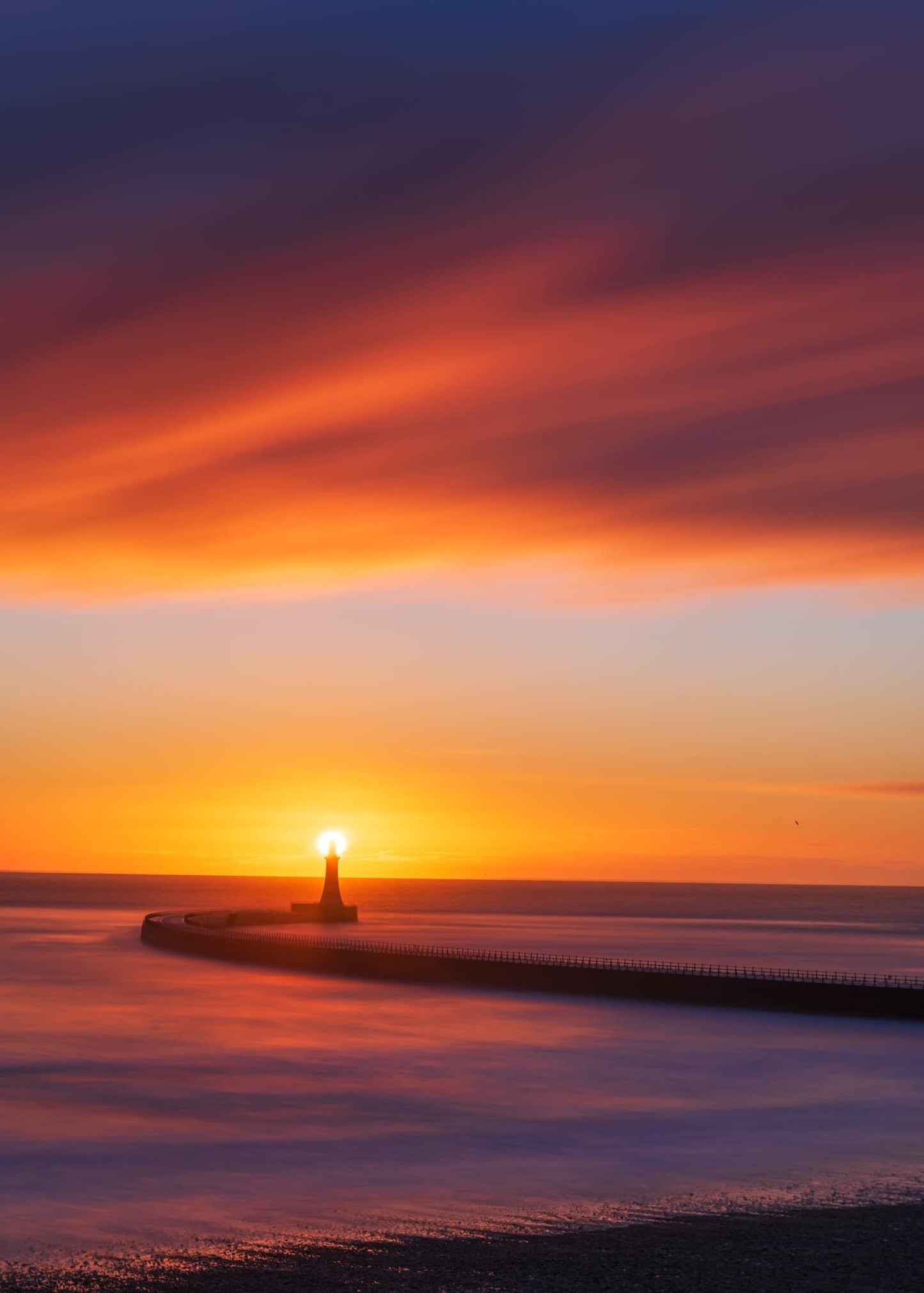 Long exposure of a beautiful Roker sunrise.