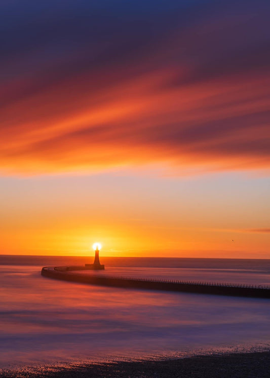 Long exposure of a beautiful Roker sunrise.