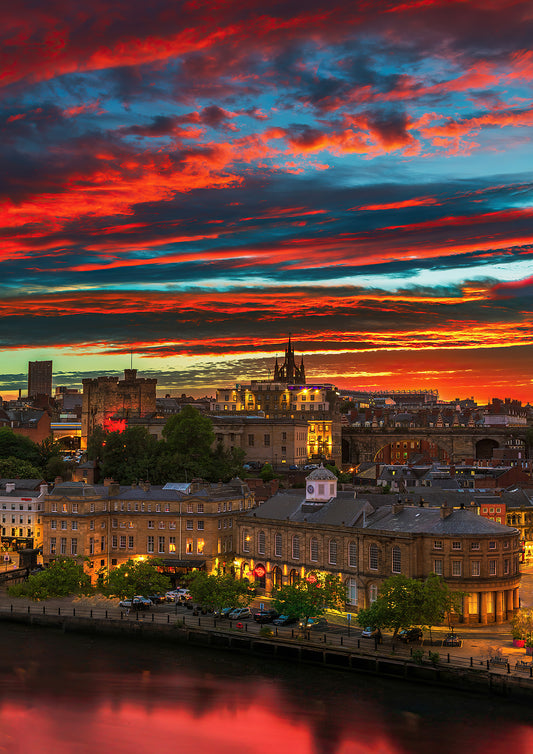Beautiful sunset skies and city lights over Newcastle.