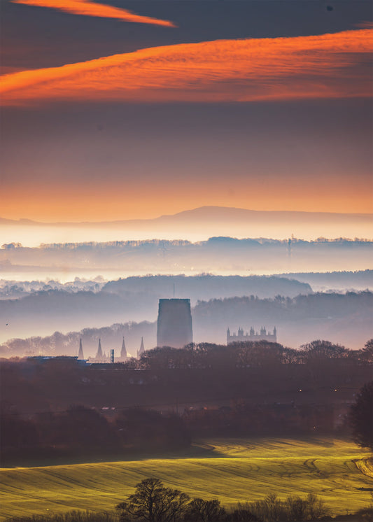 A distant view of a misty Durham Cathedral