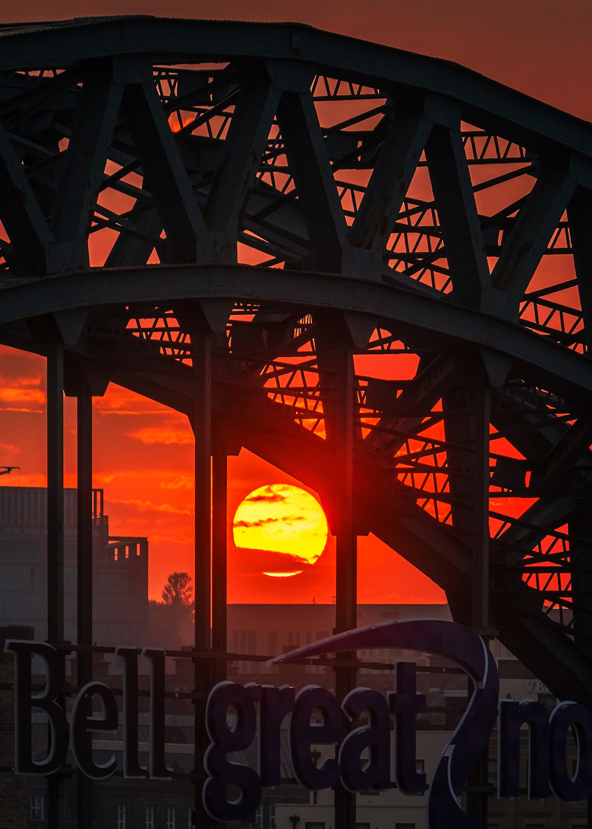 Sunset inside the bars of the Tyne bridge.
