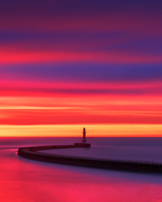 Long exposure of a beautiful Roker sunrise.