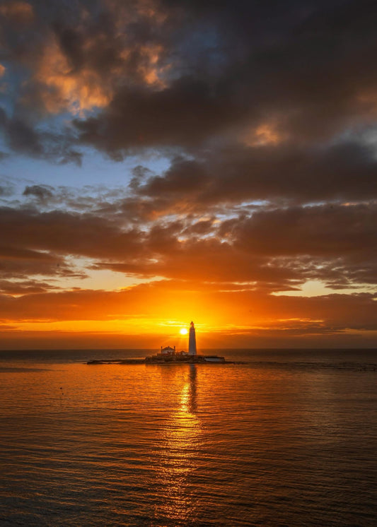 Glowing sunrise at St. Mary’s Lighthouse.