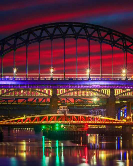 Red sky colours over Newcastle in the evening twilight.