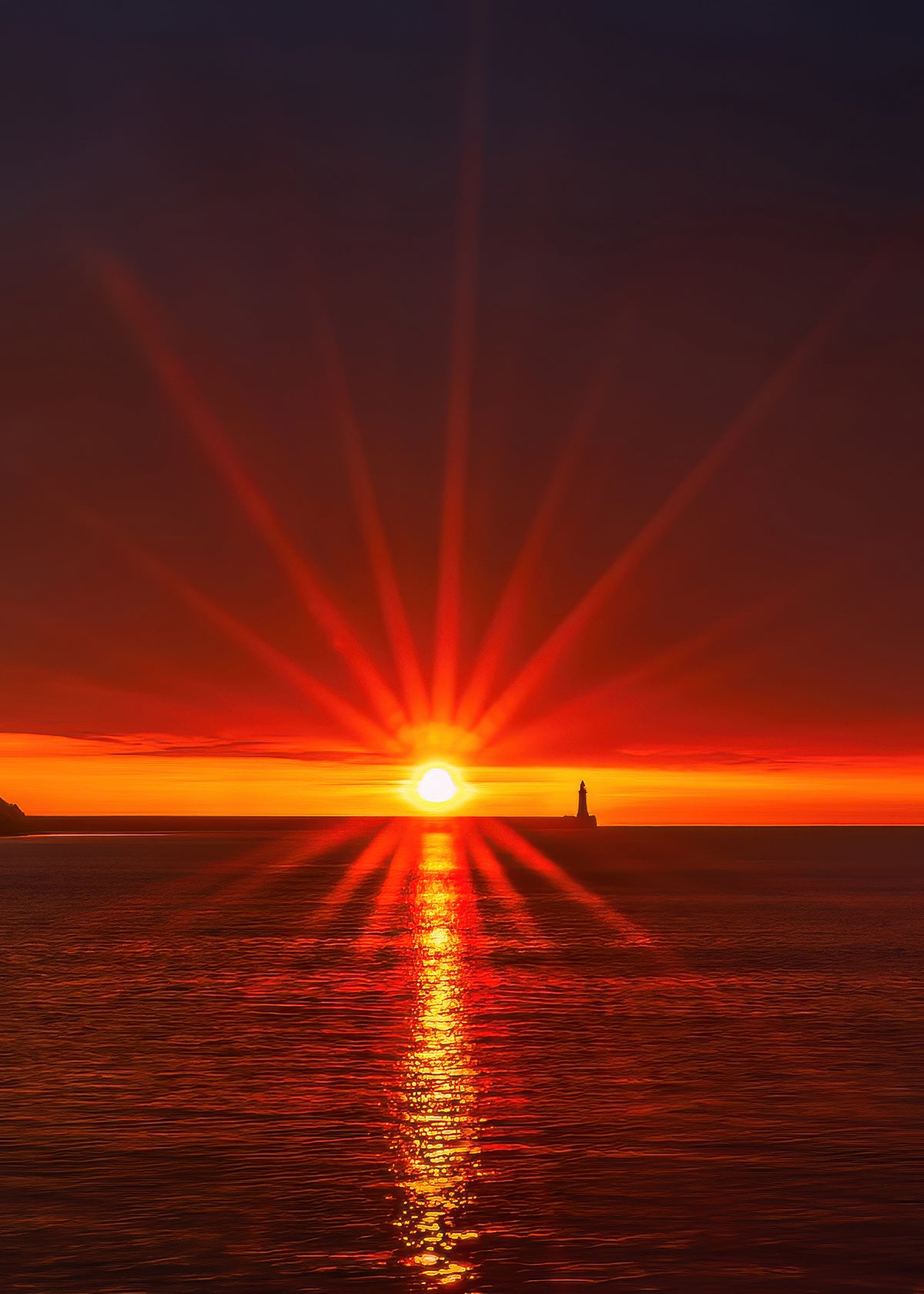 Sunburst over Tynemouth Lighthouse.