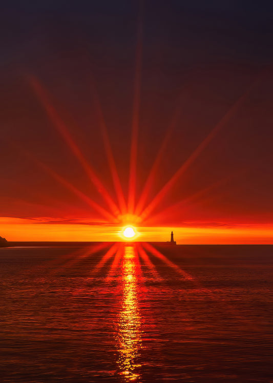 Sunburst over Tynemouth Lighthouse.
