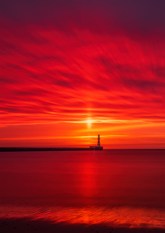 An epic fiery sunrise at Roker.
