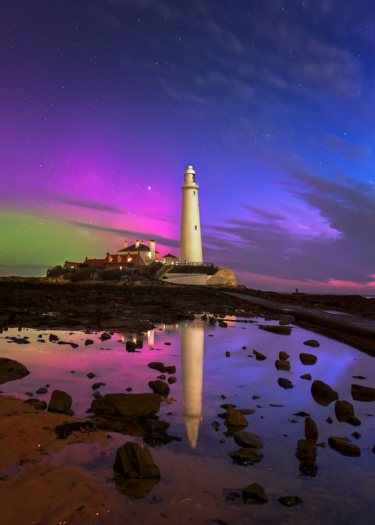 Aurora and daybreak colours over Saint Mary’s Lighthouse.