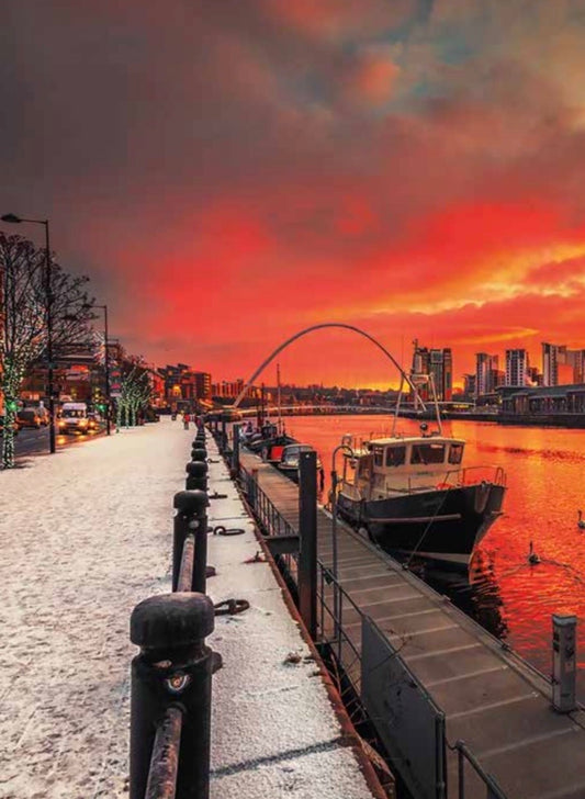 A snowy sunrise on Newcastle Quayside.