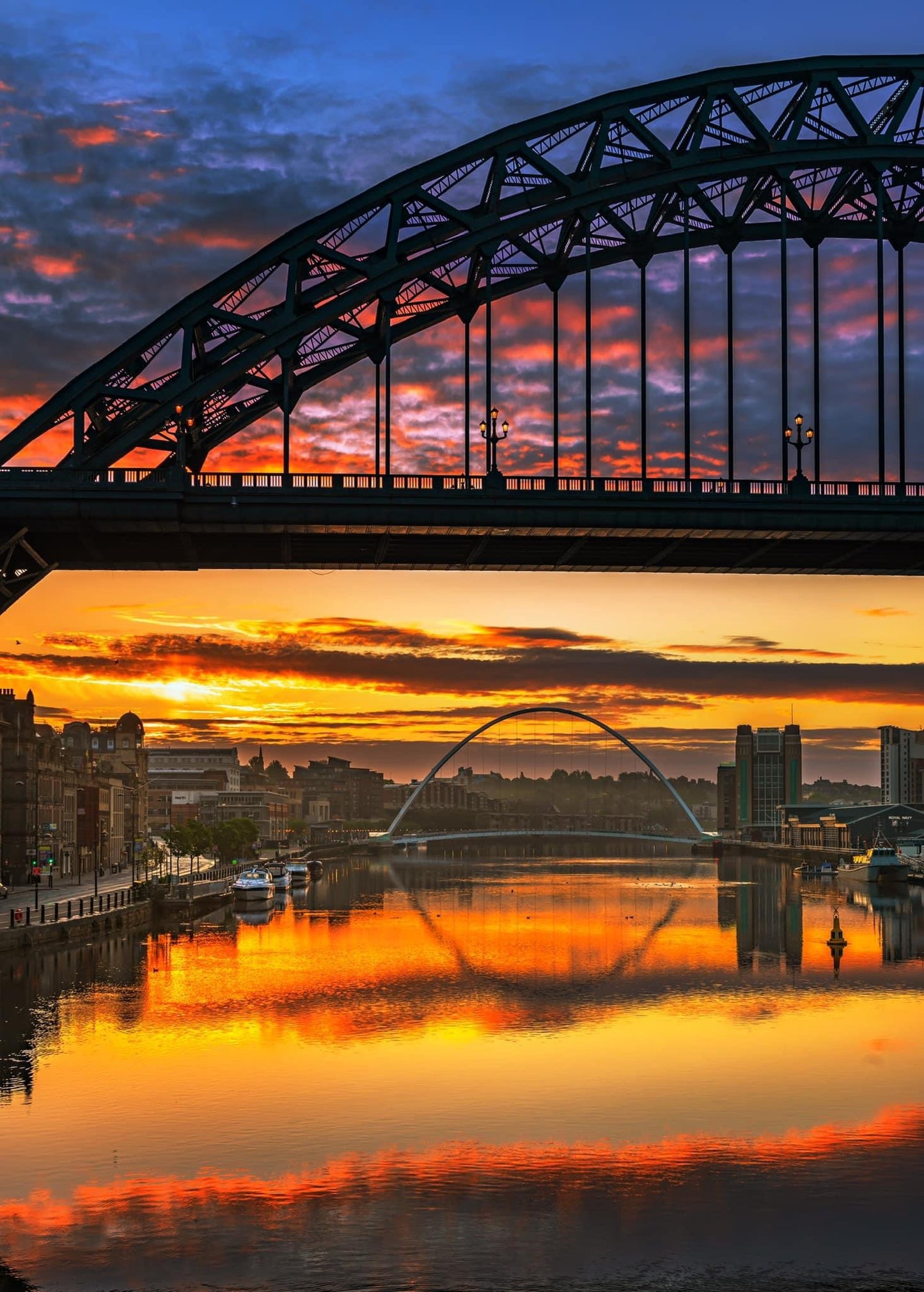 Colourful sunrise skies through the Tyne Bridge.