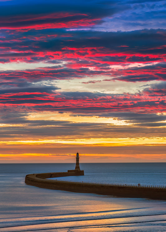 A colourful sunrise over Roker Pier.