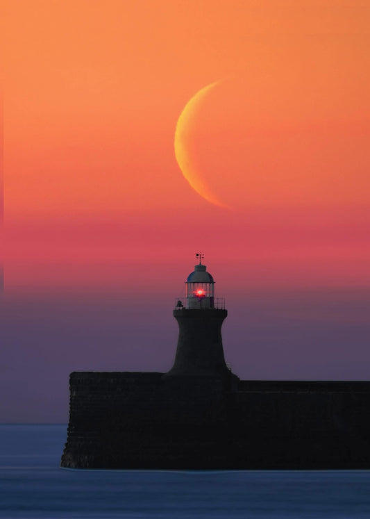 Crescent moon over South Shields Lighthouse.