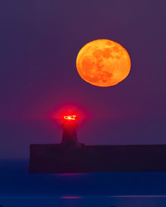 Big moon over South Shields lighthouse.