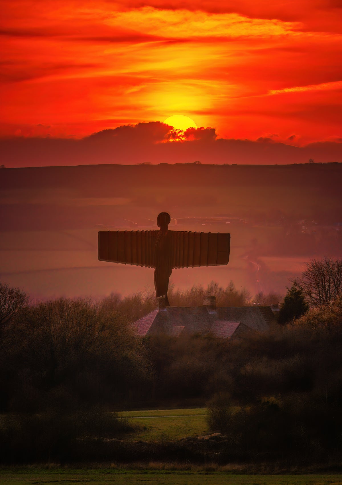Golden sunset over the Angel of the North.