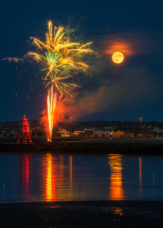 Full moon and fireworks by the Groyne Lighthouse 3