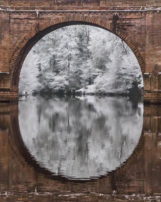 Looking through Prebends Bridge to see a Durham winter wonderland.