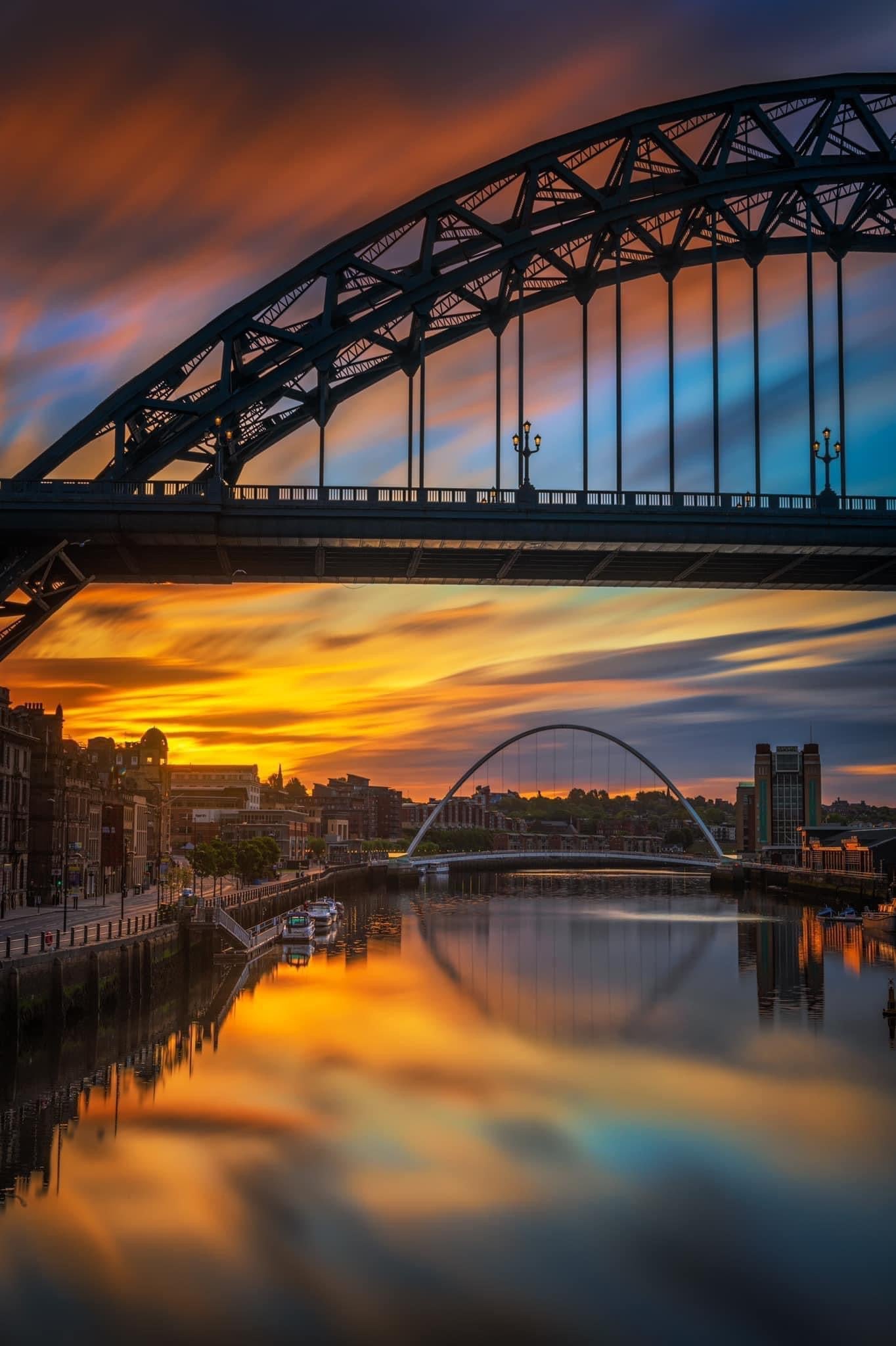 Long exposure of a colourful sunset sky over Newcastle Quayside.