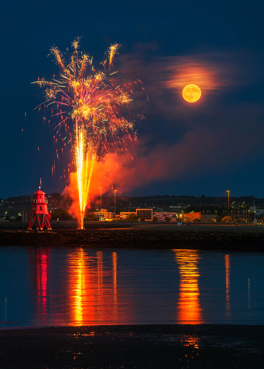 Full moon and fireworks by the Groyne Lighthouse 2