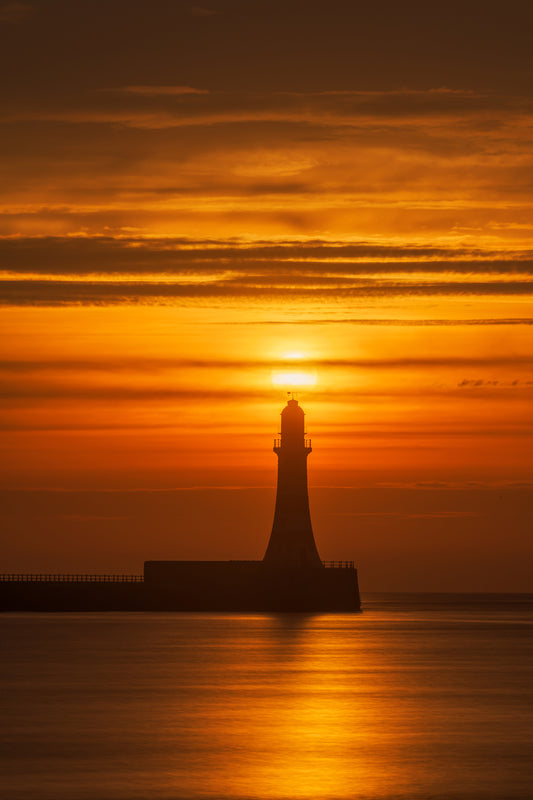 Golden sunrise over Roker Lighthouse.