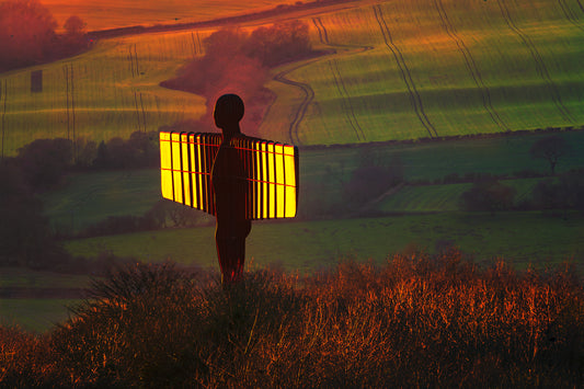 Angel of the North glowing in the setting sun.