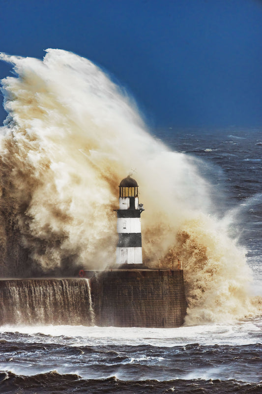 Waves crashing over Seaham Lighthouse during Storm Arwen.