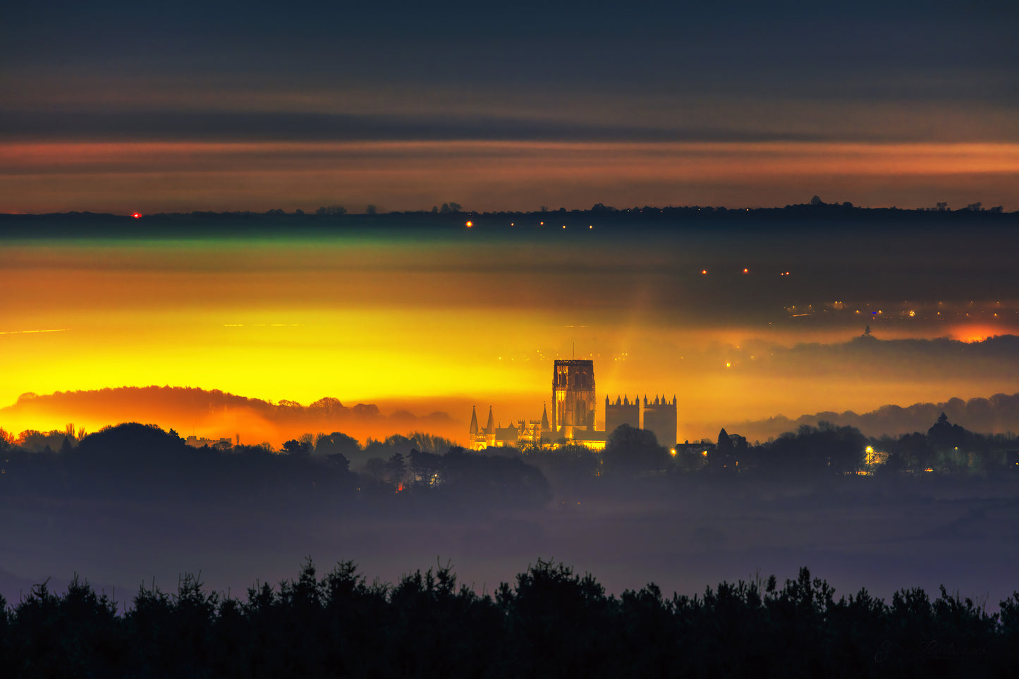 A misty night shot of Durham Cathedral.