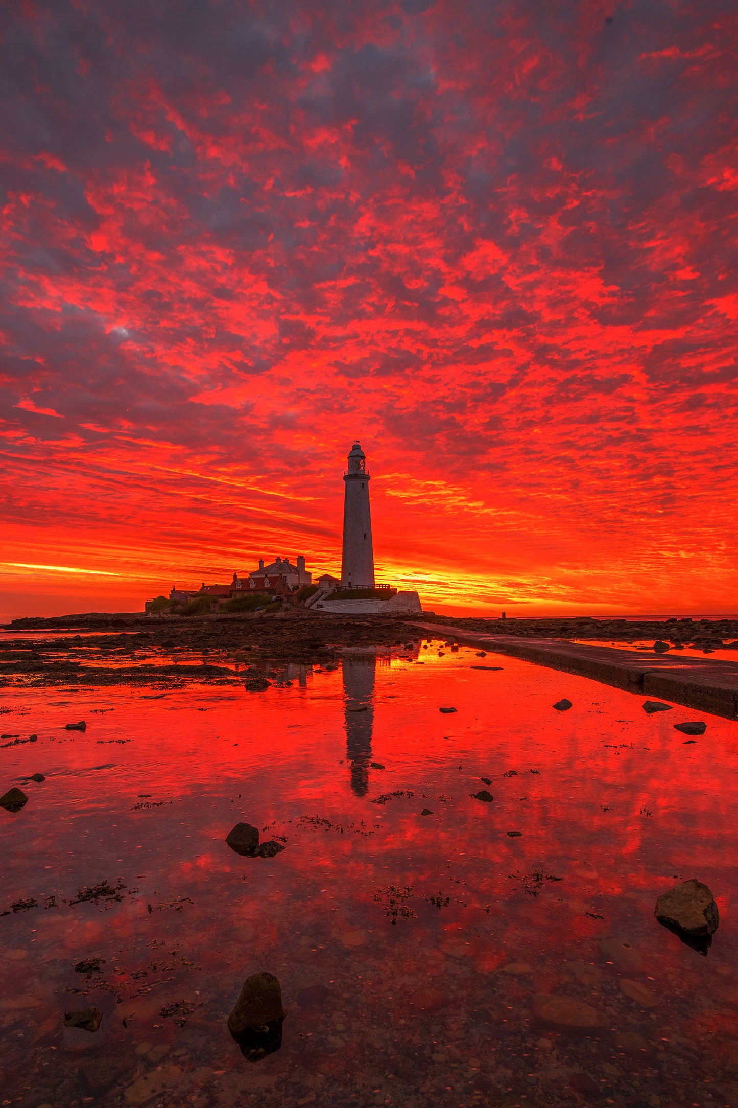 Beautiful pre sunrise sky and reflections at St. Mary's Lighthouse, Whitley Bay